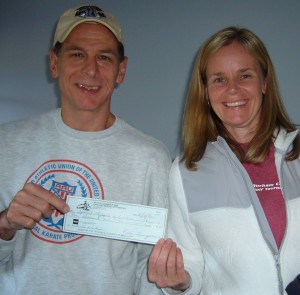 $1000 check to Kristen Randall of Durham Parks and Rec.!